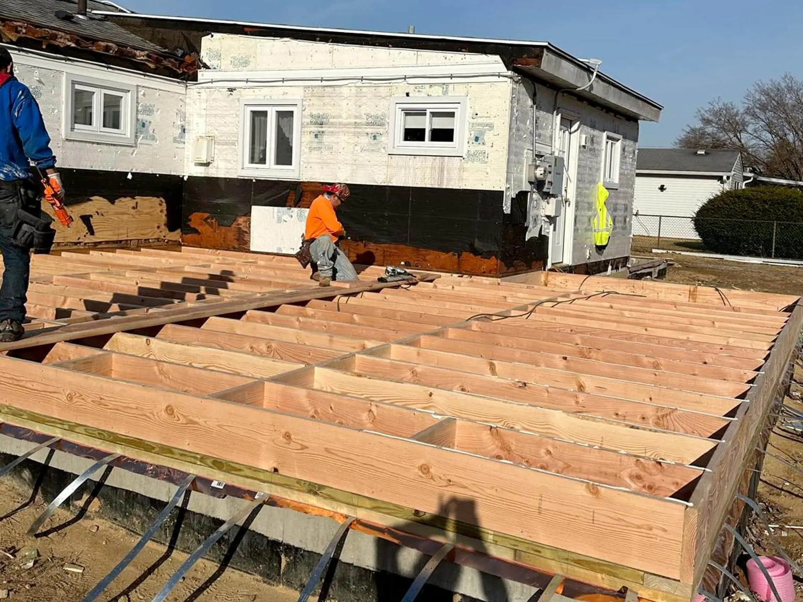 Wood floor framing for a residential home addition