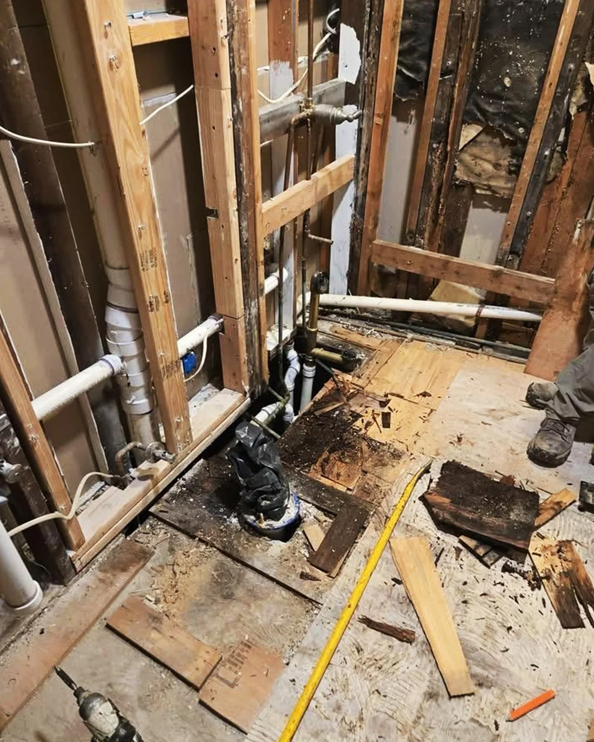 Bathroom opened during demolition to inspect hidden conditions